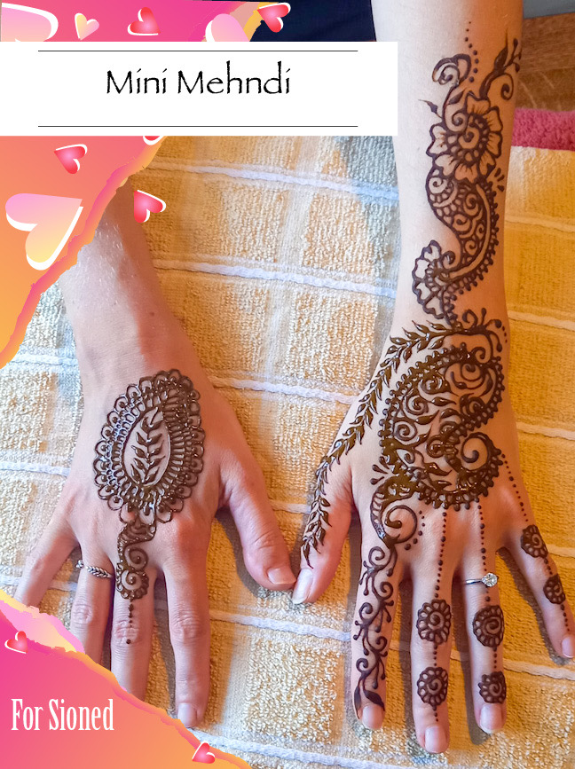 Image of mini Mehndi decorated hands