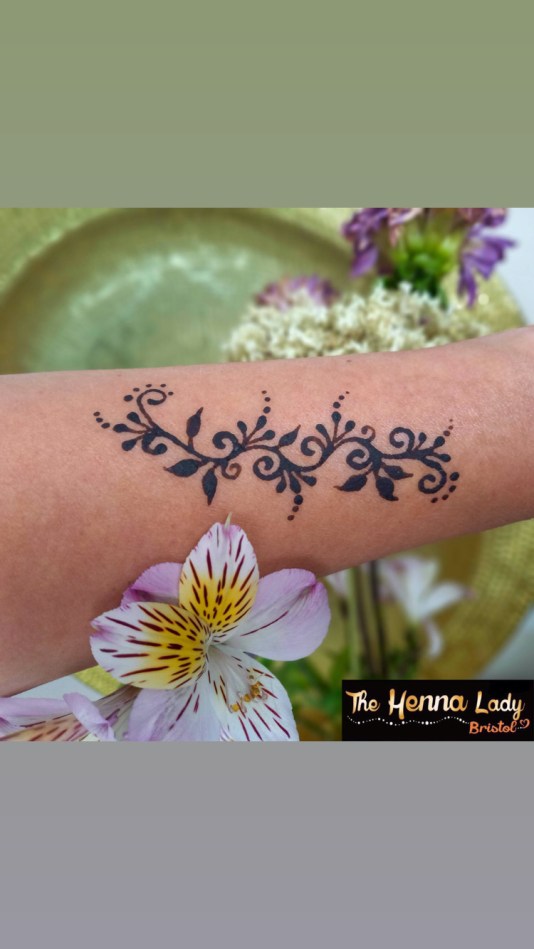 Blue/Black Jagua delicate tattoo